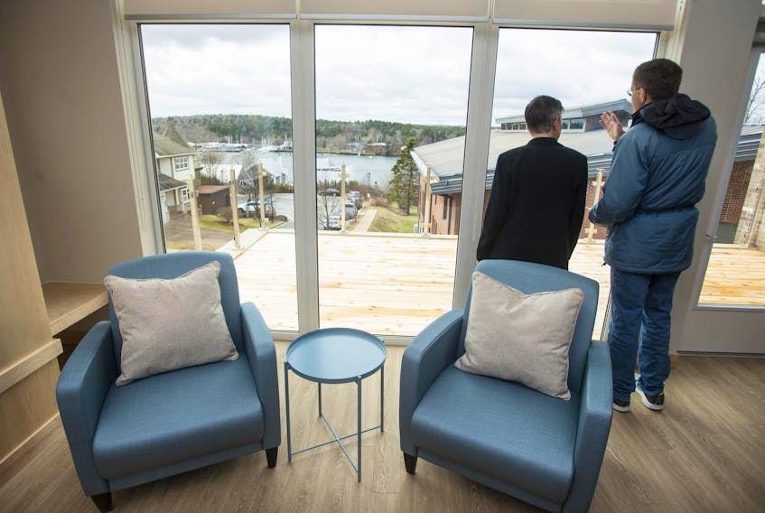 
Visitors check out the view of the Northwest Arm from the second floor of Hospice Halifax following a ribbon-cutting event in April. Patients and their families began arriving about a month ago.
