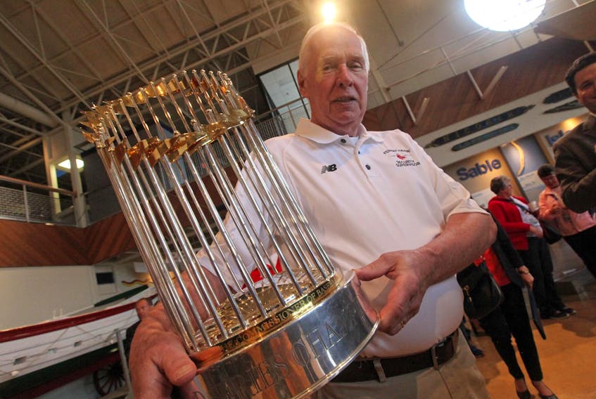 
John McDermott, security supervisor with Fenway Park in Boston, carries the 2013 World Series Trophy won by the Red Sox to an event at the Maritime Museum of the Atlantic. The trophy will once again visit Nova Scotia, on Father’s Day. (ERIC WYNNE/Staff)

