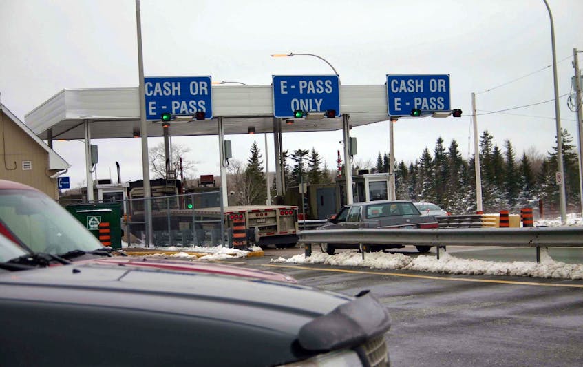 
Traffic passes through the Cobequid Pass toll booths. - Herald file
