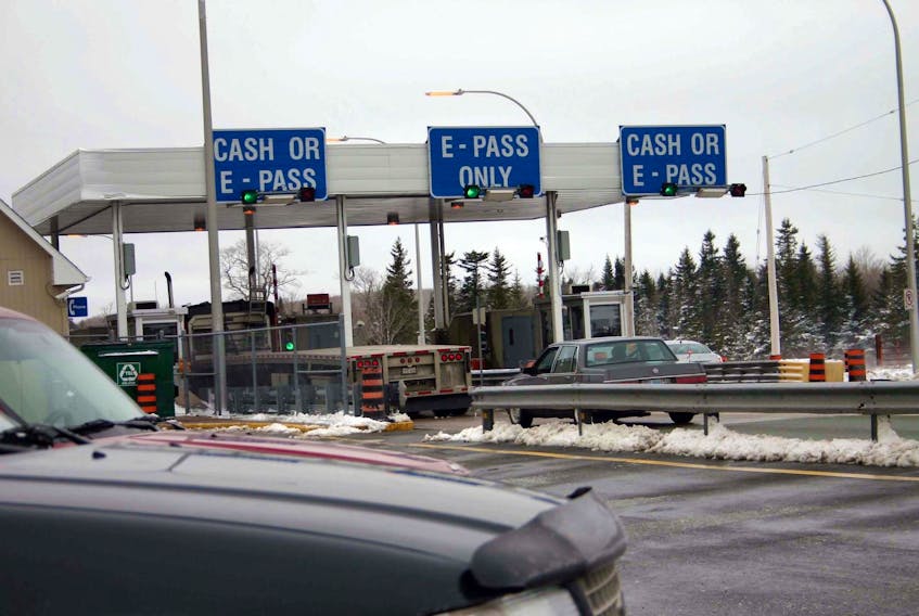 
Traffic passes through the Cobequid Pass toll booths. - Herald file
