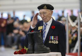 
Henry Ardwell Francis Eyres salutes after laying a rose during the Boots of Remembrance portion of the 75th anniversary of D-Day ceremonies at Willow Park Armoury in Halifax on Thursday, June 6, 2019. - Tim Krochak
