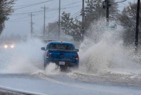 
A truck drives through deep water on the main road through Wedgeport, Yarmouth County, on Thursday, June 6, 2019. - Tina Comeau
