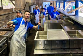 
It’s all smiles over the flat top at the Halifax Greek Fest. - Maan Alhmidi
