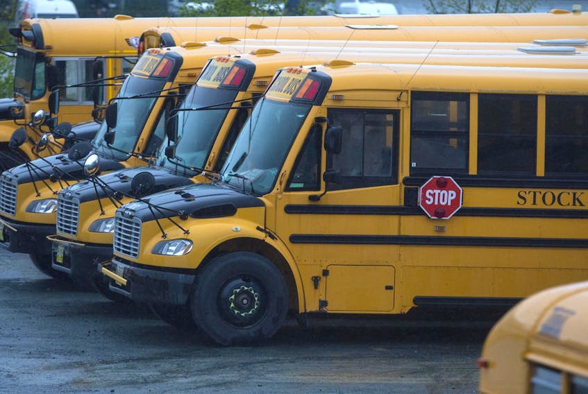 
School buses are parked in the back lot of Stock Transportation’s Burnside location on Thursday. - Ryan Taplin
