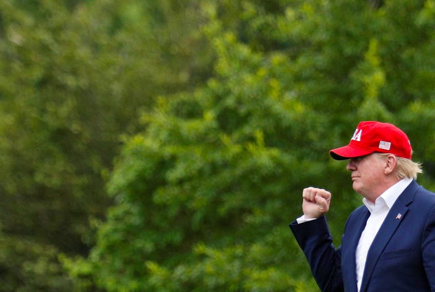 
U.S. President Donald Trump waves to supporters as he arrives home to the White House in Washington on June 7, 2019, after overseas travel. - Tom Brenner / Reuters
