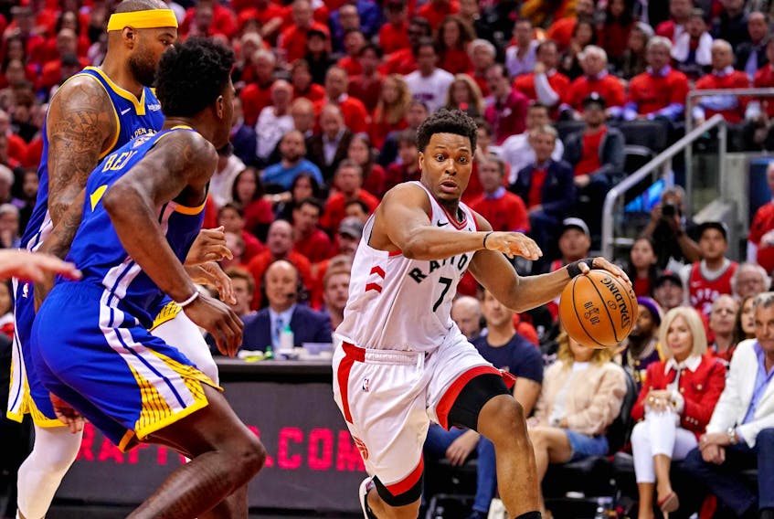 
Toronto Raptors guard Kyle Lowry (7) drives to the basket against Golden State Warriors forward Jordan Bell (2) during the fourth quarter in game five of the 2019 NBA Finals at Scotiabank Arena on Monday, June 10, 2019. - Kyle Terada / USA TODAY Sports
