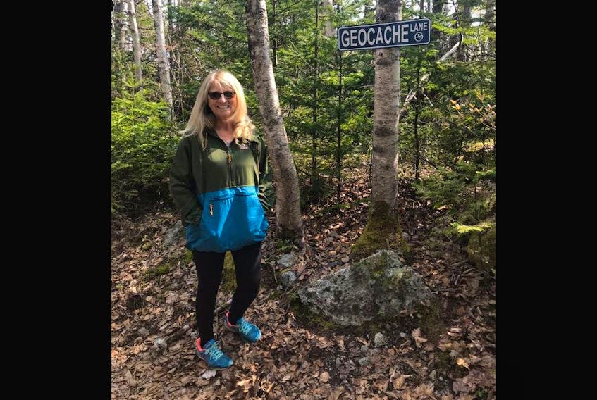 
The first is a visit to Canada’s first geocache called GCBBA. It is located just outside Chester, N.S., and it was placed in June 2000 and has about 3,000 logged visits. Brenda Bulger is pictured on the trail to the cache — aptly named “Geocache Lane.” 
