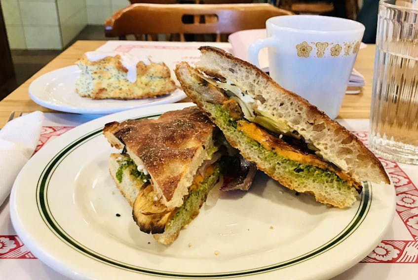
The veggie sandwich at Cafe Good Luck uses turnip top pesto to add a salty garlicky kick.
