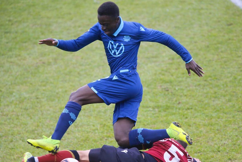 
Halifax Wanderers FC’s Mohamed Kourouma scored in Wednesday’s road game against Valour FC. He is shown being tackled by Valour’s Louis Beland-Goyette during last week’s game at the Wanderers Grounds. (Tim Krochak/The Chronicle Herald)
