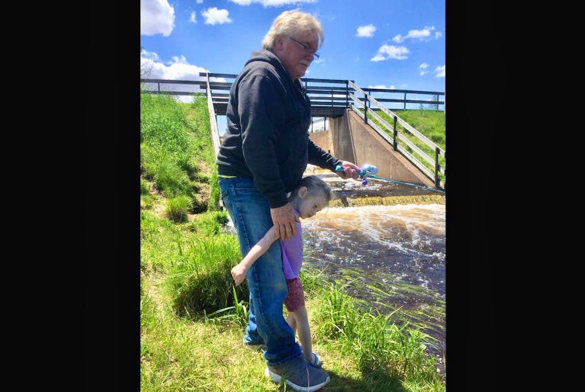 
Doug Barkhouse and his three-year-old granddaughter Madison Barkhouse recently got in trouble for their joint effort to have some fun with a fishing rod. - Contributed
