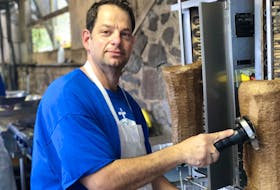 
Michael Nicoletopoulos makes sure the donair is as fresh as it should be for guests of the annual Halifax Greek Fest. - Maan Alhmidi
