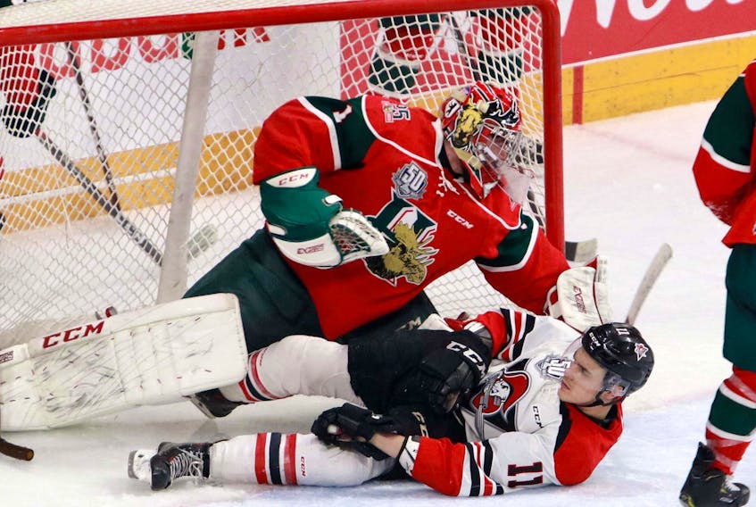 
Drummondville Voltigeurs forward Brandon Skubel slides into Halifax Mooseheads goaltender Alexis Gravel during a QMJHL game at the Scotiabank Centre this season. (ERIC WYNNE/Chronicle Herald)
