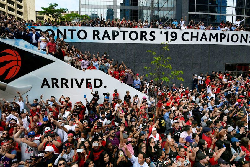 
Fans fill the streets of downtown Toronto during the Raptors’ victory parade after defeating the Golden State Warriors in the 2019 NBA Finals on Monday. - Moe Doiron/Reuters
