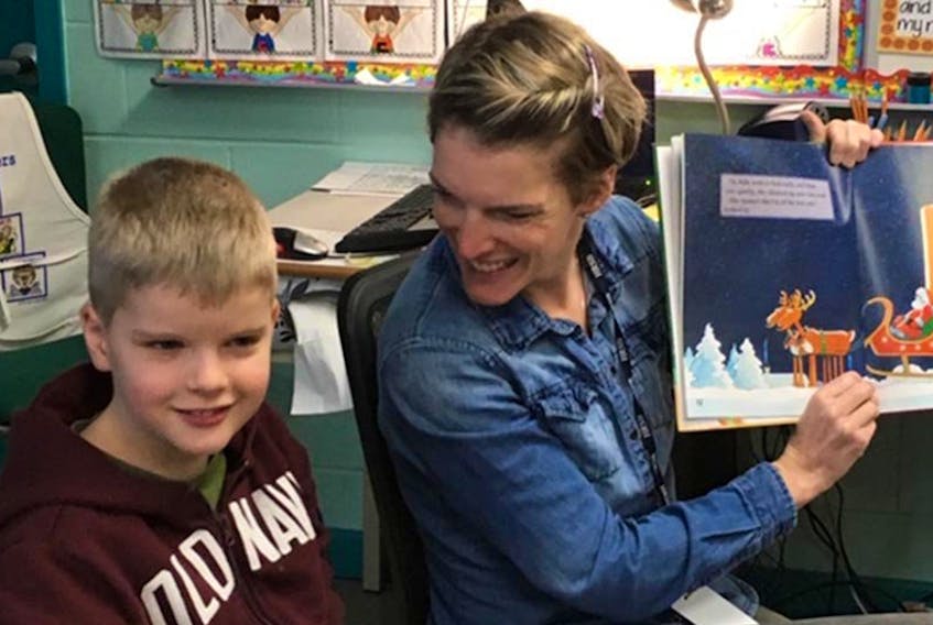 
Hugh and his mom Allison Garber read to Hugh’s Grade 3 class this year. - Contributed
