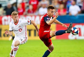 
FC Dallas defender Bressan (4) controls the ball as Toronto FC midfielder Jacob Shaffelburg (24) defends during the second half of an MLS game on Saturday at Toyota Stadium in Frisco, Tex. - Kevin Jairaj/USA TODAY Sports

