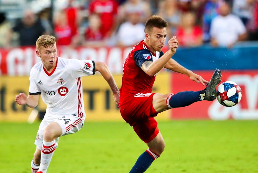 
FC Dallas defender Bressan (4) controls the ball as Toronto FC midfielder Jacob Shaffelburg (24) defends during the second half of an MLS game on Saturday at Toyota Stadium in Frisco, Tex. - Kevin Jairaj/USA TODAY Sports
