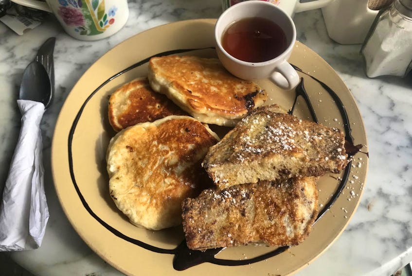 
 The pancakes at Annie’s Place were golden, puffy, and not sweet, the true sign of homemade. I did, however, find myself wishing the French toast had taken a longer dunk in egg mixture as the bread was slightly dry in the middle. 
