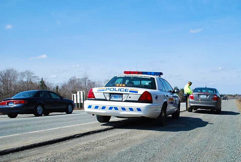 
Police pull a car over on a 100-series highway in Nova Scotia. On Wednesday, RCMP held a checkpoint on Highway 101 to raise awareness of the Move Over law. - File 
