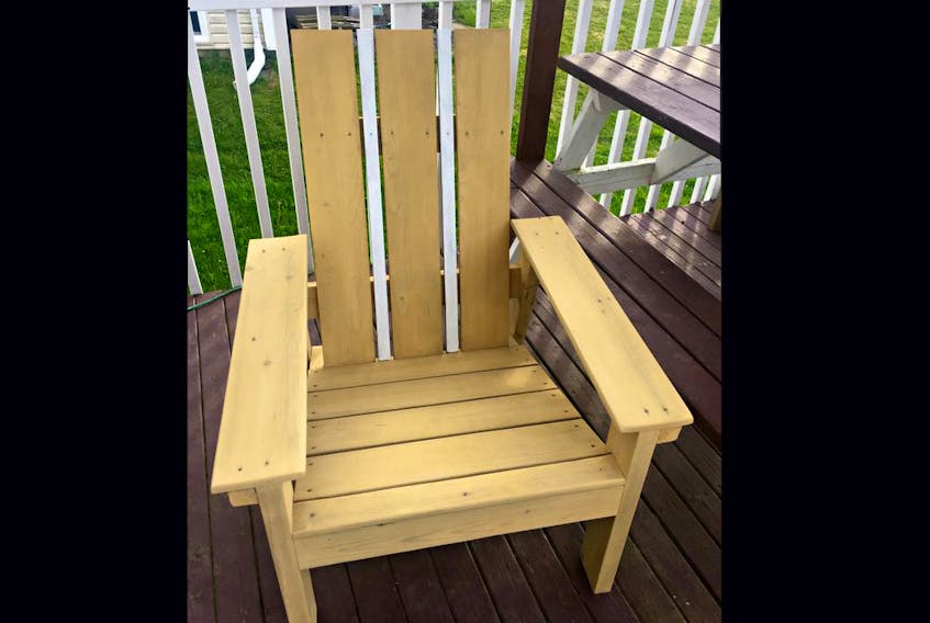 
Heather finished the chair by painting two white “racing stripes” down the back, and it started pouring before she got the chair set up on the lawn. - Heather Laura Clarke
