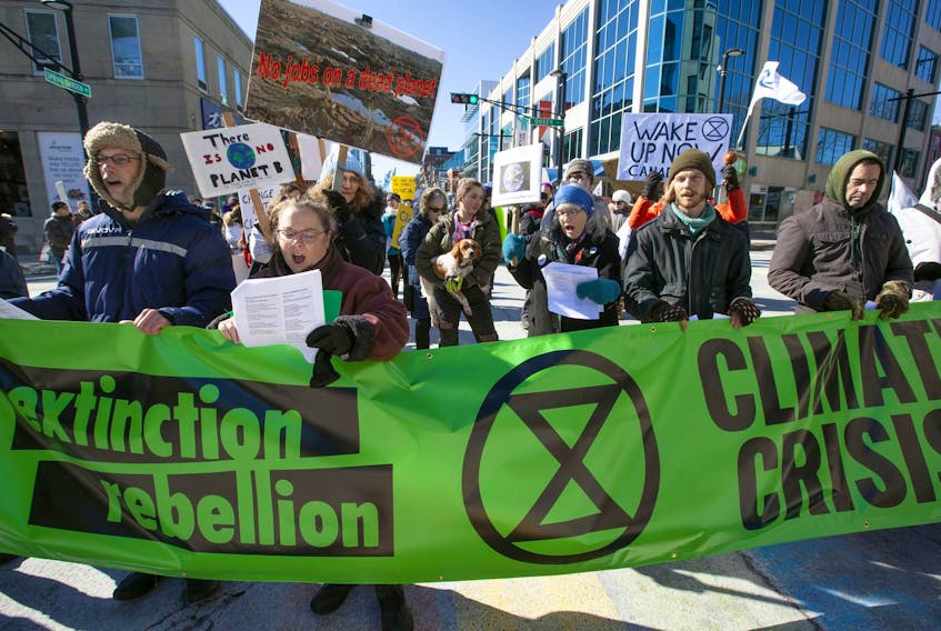 
About 250 people blocked Spring Garden Road at Queen Street briefly as they participated in a climate crisis protest outside the Halifax Central Library in February. - Eric Wynne / File
