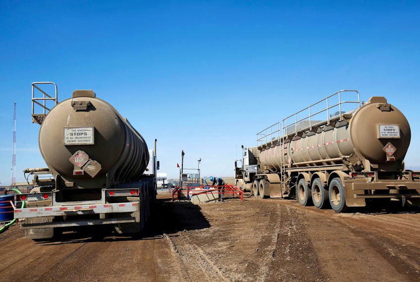 
A tanker truck used to haul oil products operates at an oil facility near Brooks, Alberta in 2018. - Todd Korol/Reuters

