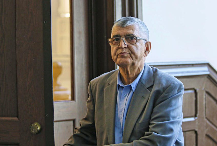 
Taxi driver Seyed Abolghasem Sadat Lavasani Bozor, 74, leaves Halifax provincial court Monday during a break at his trial on a charge of sexual assault. - Tim Krochak
