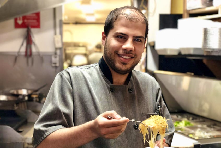 
Alaa Eddin Alakkam makes Knafeh at his family’s restaurant, 902 Restaurant, in Halifax. - Maan Alhmidi
