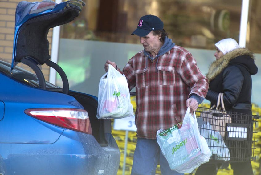 
A shopper loads grocery bags into a taxi at the Mumford Sobeys last year. Ryan Taplin - The Chronicle Herald
