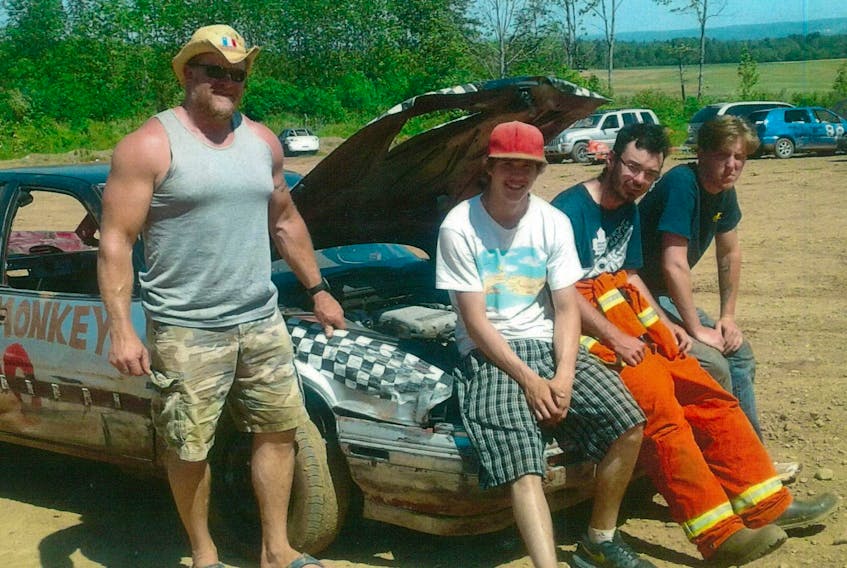 
Students from Lawrencetown Education Centre are shown at Valley Raceway where they built and raced two dirt track cars as part of the school’s Energy Power and Technology course. Shown from left to right are Principal Jamie Peppard, Kendall Kerr, Austin Charron, and Austin Ransier. 
