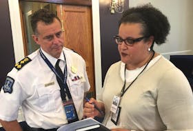 
Halifax Police Chief Dan Kinsella and Natalie Borden, chairwoman of the Halifax police commission, confer at Wednesday’s commission meeting at city hall. - Francis Campbell
