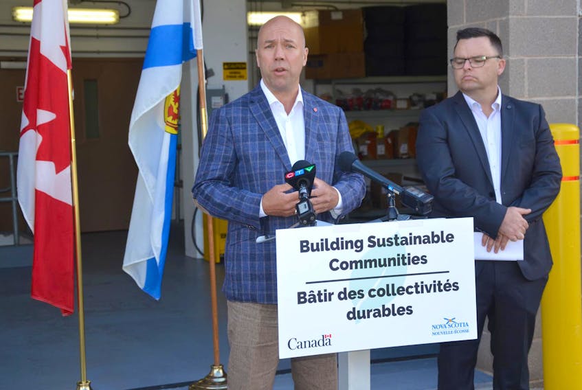 
Halifax MP Andy Fillmore and Halifax Atlantic MLA Brendan Maguire announce a $5.7-million federal and provincial contribution for a project to extend municipal water and sewer services to residents of the Herring Cove area. - Francis Campbell
