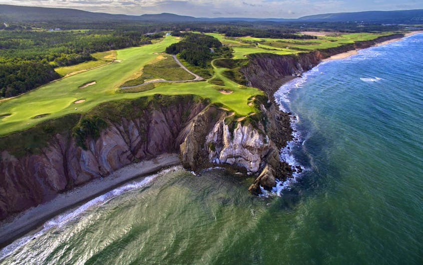 An aerial photo of the 16th hole of Cabot Cliffs golf course in Inverness.