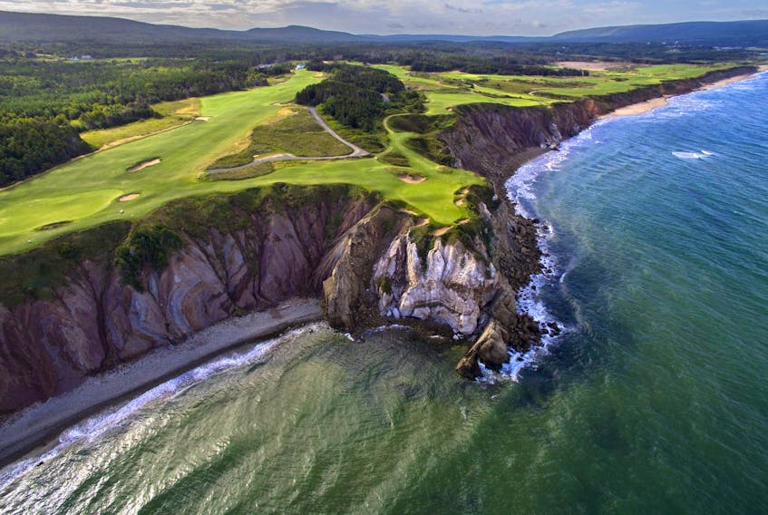 An aerial photo of the 16th hole of Cabot Cliffs golf course in Inverness.