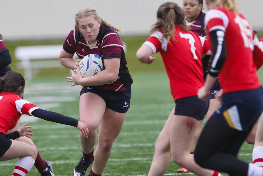 
Citadel Phoenix’s Emma MacDougall works the ball upfield during action against Halifax West during a metro high school game on the Mainland Common in Halifax on May 16, 2019. - Tim Krochak
