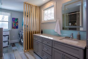 
The lack of functional storage in this bathroom was another driving force behind the renovation. - AMacPhotography
