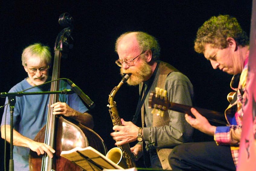 
From left,  Skip Beckwith, Don Palmer and Scott Macmillan  perform in this file photo from 2013. - Tim Krochak
