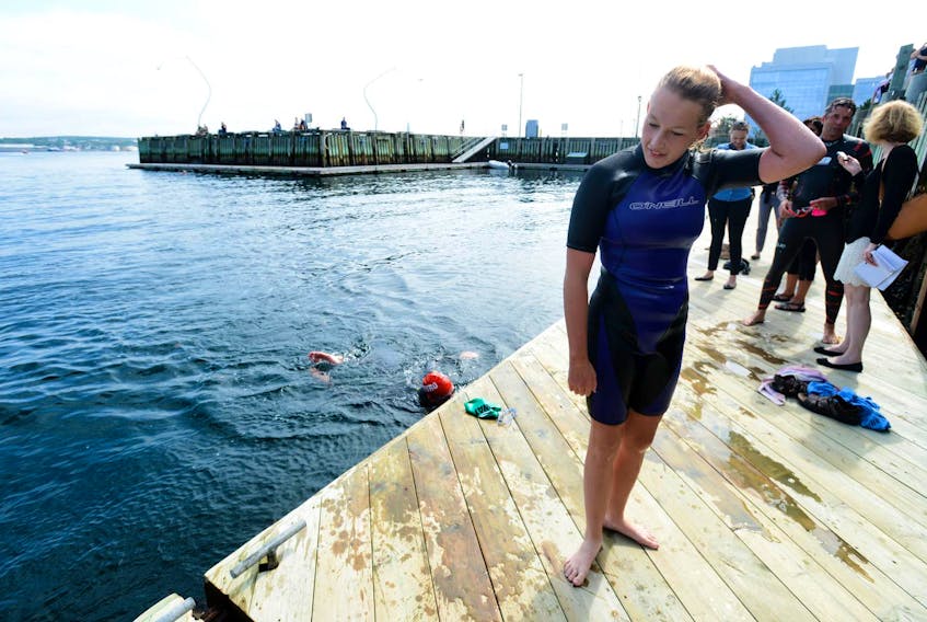 
Anny Christian, from Lower Sackville stands on the dock after completing a swim from the Woodside Ferry terminal in Dartmouth to Bishoph's Landing in Halifax in 2015. - File
