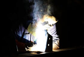 
A worker at Cherubini Metal Works Ltd. uses an arc welder on a job on the shop floor of the company’s Burnside location. - Eric Wynne


