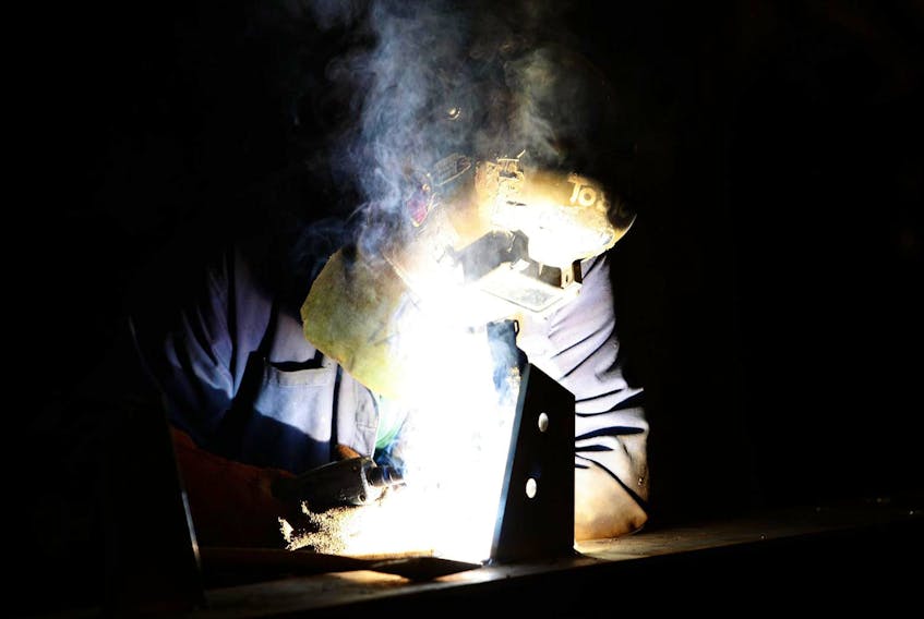 
A worker at Cherubini Metal Works Ltd. uses an arc welder on a job on the shop floor of the company’s Burnside location. - Eric Wynne



