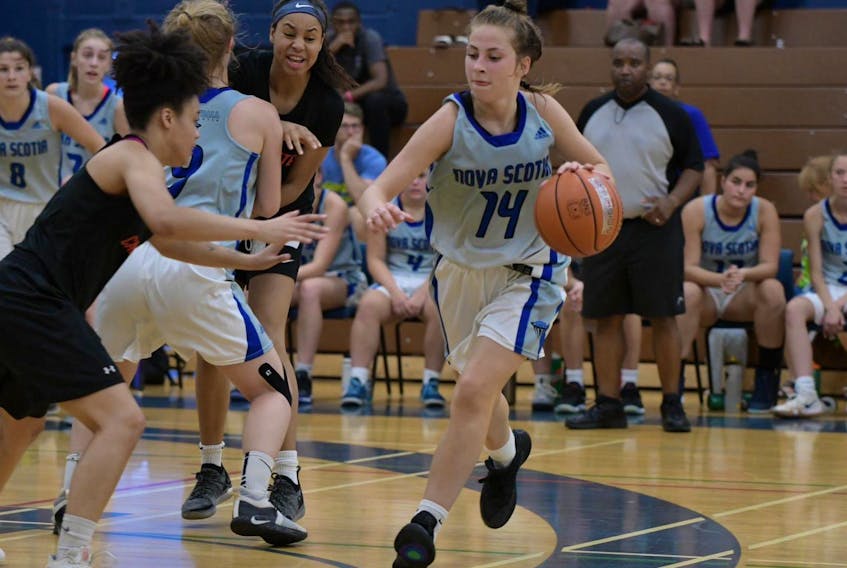 
Nova Scotia’s Sydney Cummins drives against Manitoba in a 65-50 win at the Canadian under-17 girls basketball championship in Victoria, B.C., on Saturday. (BASKETBALL NOVA SCOTIA)
