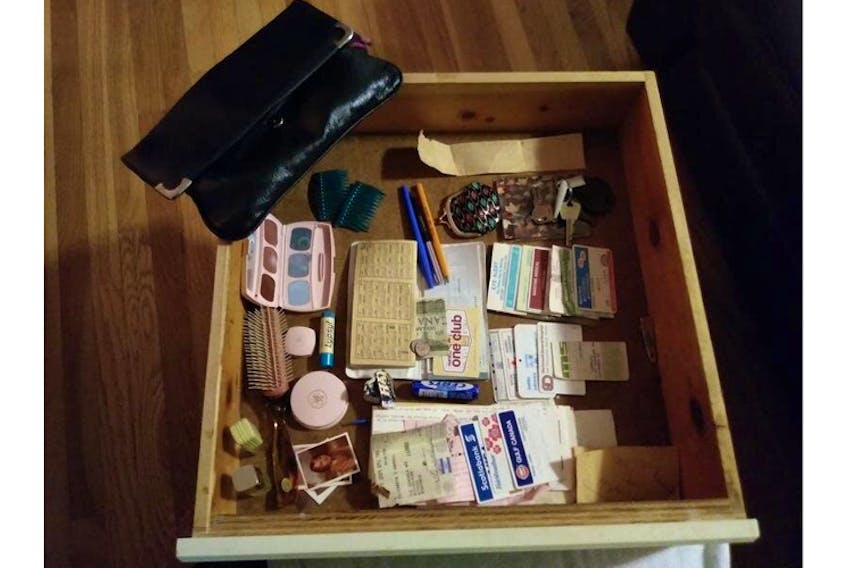 
Liz Campbell’s purse and the items that were inside of it are displayed in a recent photo. Campbell was reunited with her purse on Tuesday after it was stolen 39 years ago. - Liz Campbell
