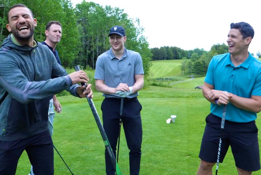 
Sidney Crosby and Nathan MacKinnon laugh during a round of golf with Paul Bissonnette, left, and Ryan Whitney at Ashburn’s New Course. (CONTRIBUTED)
