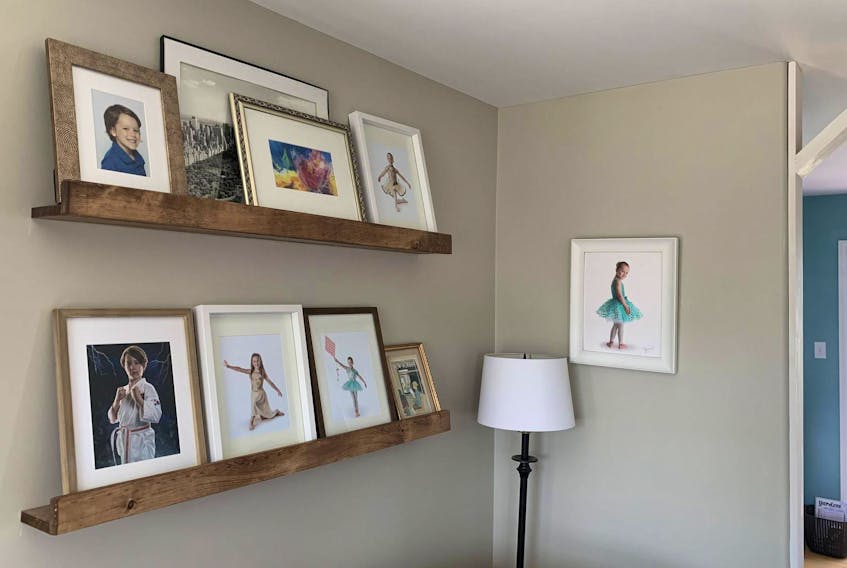 
Heather loves her new, wider photo ledges — and so far, the frames are staying put! - Heather Laura Clarke
