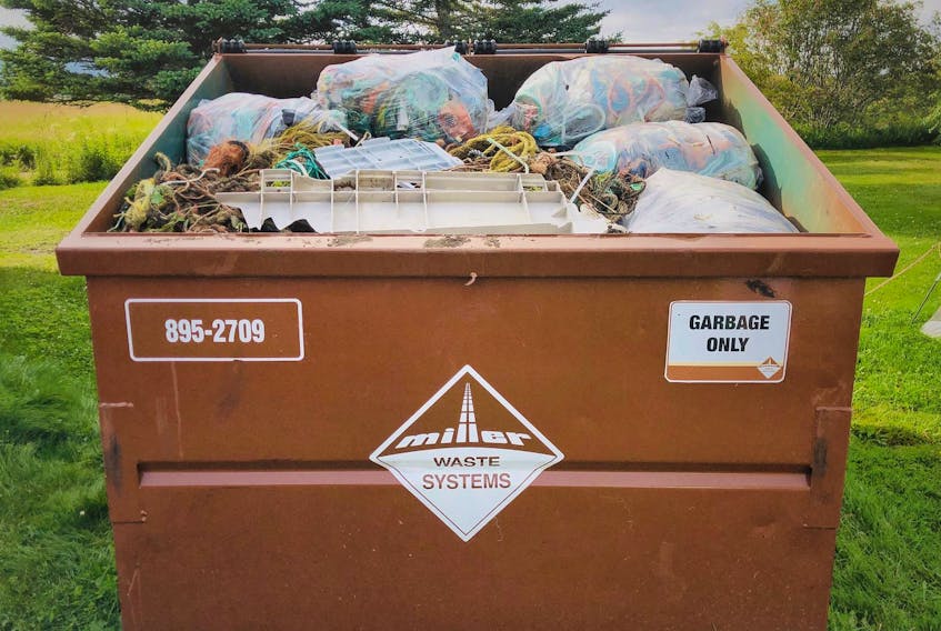 
Bob Hamilton and a handful of volunteers have filled three dumpsters with trash collected off West Advocate Beach this summer and they've only just started. - Allen Shepherd
