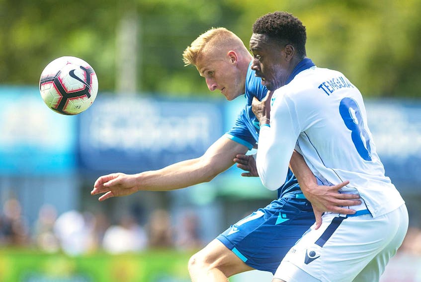 
HFX Wanderers forward Tomasz Skublak and FC Edmonton centre back Mele Temguia chase down a loose ball during Canadian Premier League action Monday at the Wanderers Grounds. Ryan Taplin - The Chronicle Herald

