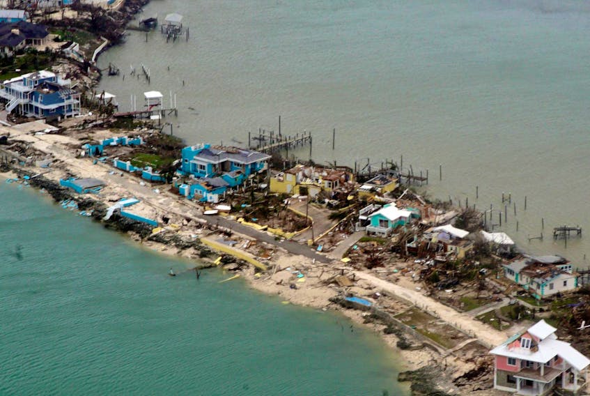 
An aerial view of a row of damaged structures seen from a U.S. Coast Guard aircraft in the aftermath of hurricane Dorian, in Bahamas, Tuesday, Sept. 3, 2019. - Adam Stanton / U.S. Coast Guard Atlantic Area via Reuters
