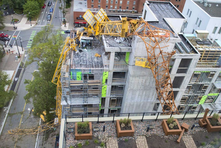 The building crane that collapsed on South Park Street in downtown Halifax during hurricane Dorian is seen from the nearby Trillium condominium in September 2019. - Ryan Taplin