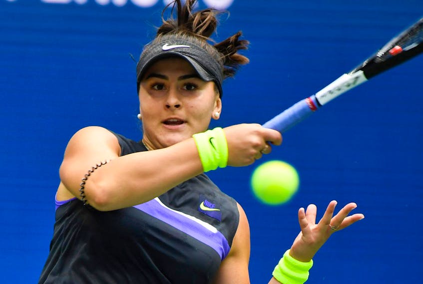 
The ferocious Bianca Andreescu slams a ball back to Serena Williams in the U.S. Open final in New York on Saturday.
