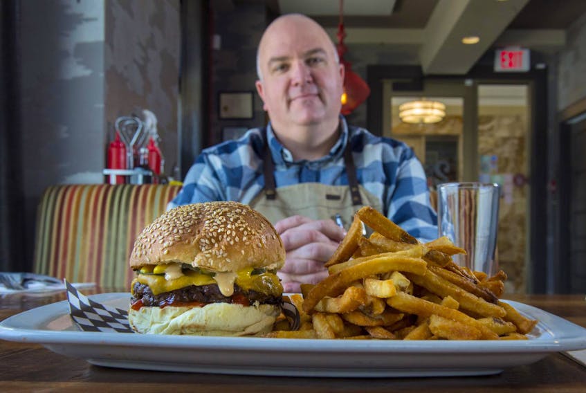 
Chef Craig Flinn with his Old School Cheeseburger at Two Doors Down. He’ll soon be opening another edition of Two Doors Down in Dartmouth Crossing. - Ryan Taplin/The Chronicle Herald

