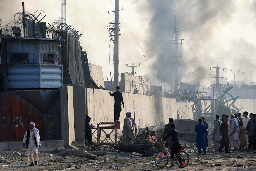 
Angry Afghan protesters burn tires and shout slogans at the site of a blast in Kabul, Afghanistan on Sept. 3, 2019. - Omar Sobhani / Reuters
